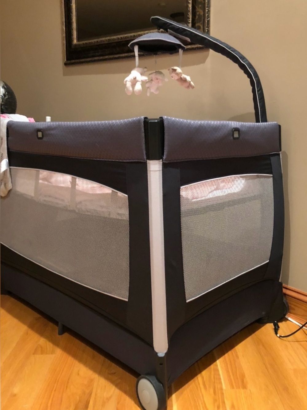Chicco 
Gray Portable Kids Playard with Overhead Mobile